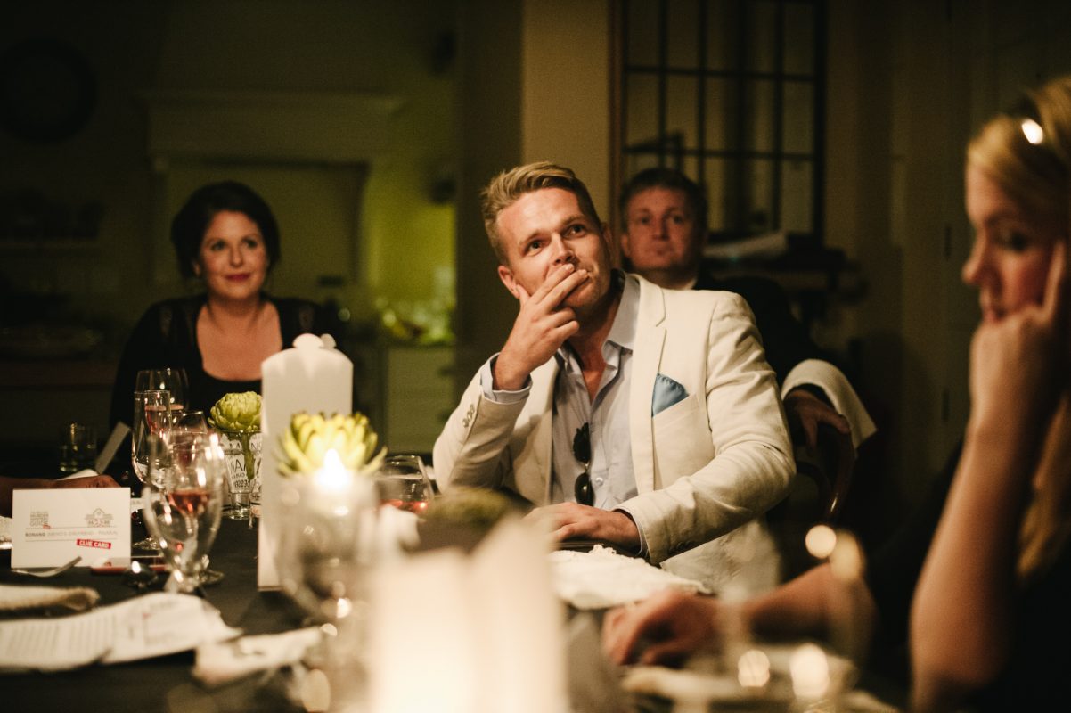 Greg Kriek at a Murder Mystery Guide dinner party.